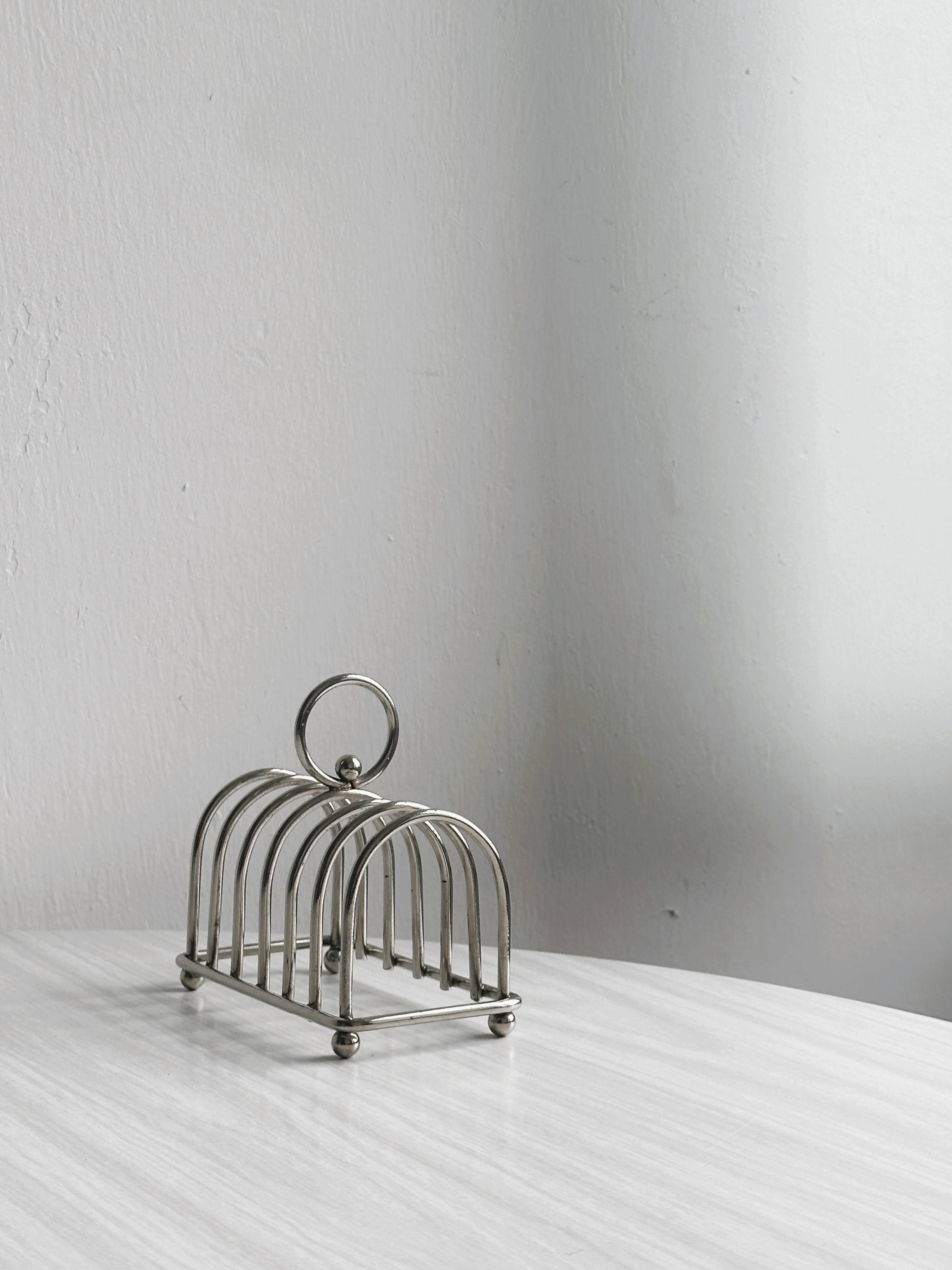 Stainless steel toast rack.