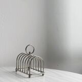 Stainless steel toast rack.