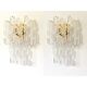 A pair of transparent “ricci” murano glass wall sconces