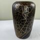 Vase with golden scales