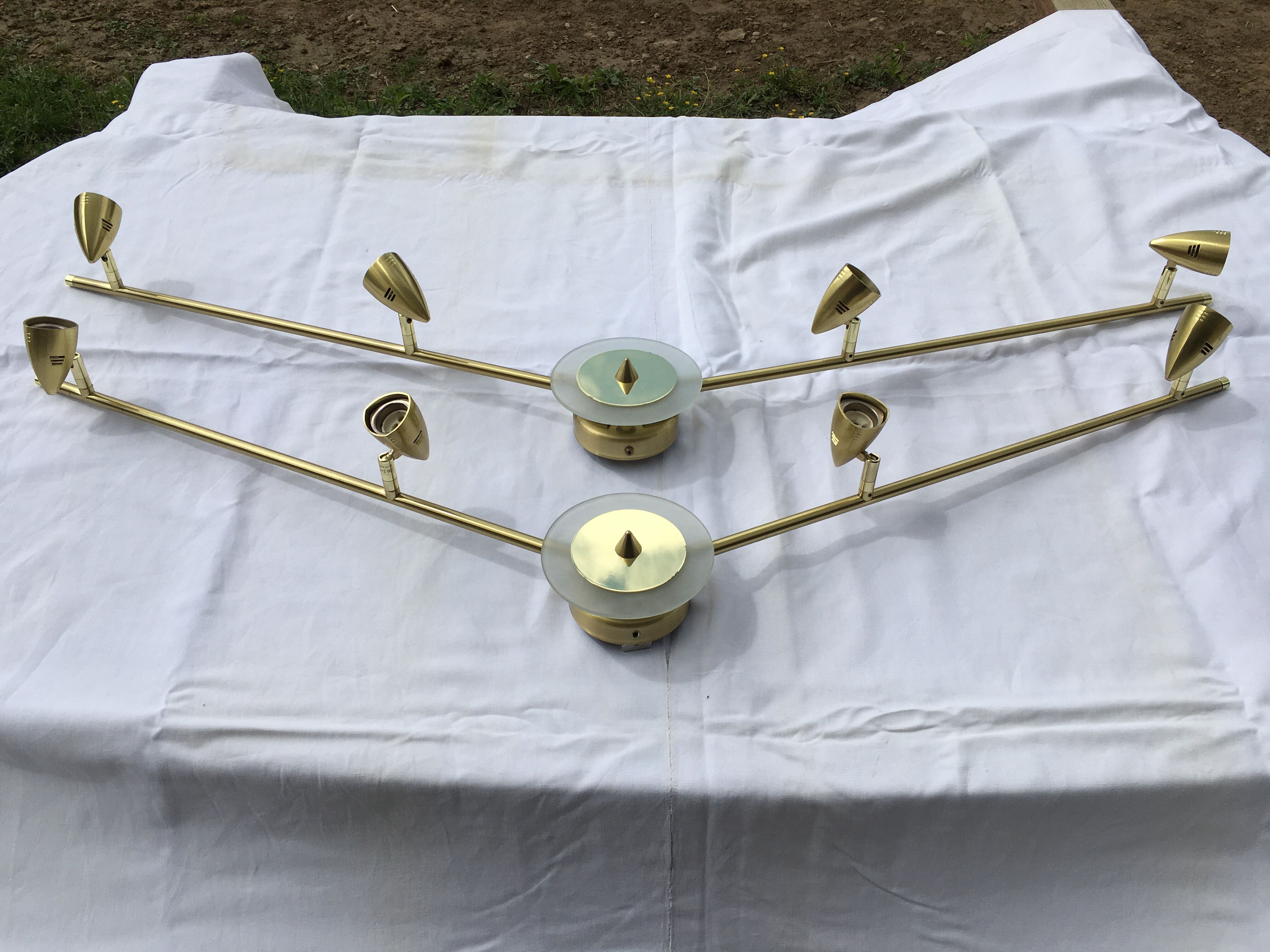 Pair of gold brass design sconces