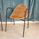 Pair of chairs / vintage armchairs in rattan and black lacquered metal
