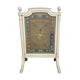 Front of Louis XVI fireplace in laqué wood and fabric has floral decorations