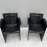 Pair of armchairs in black leather