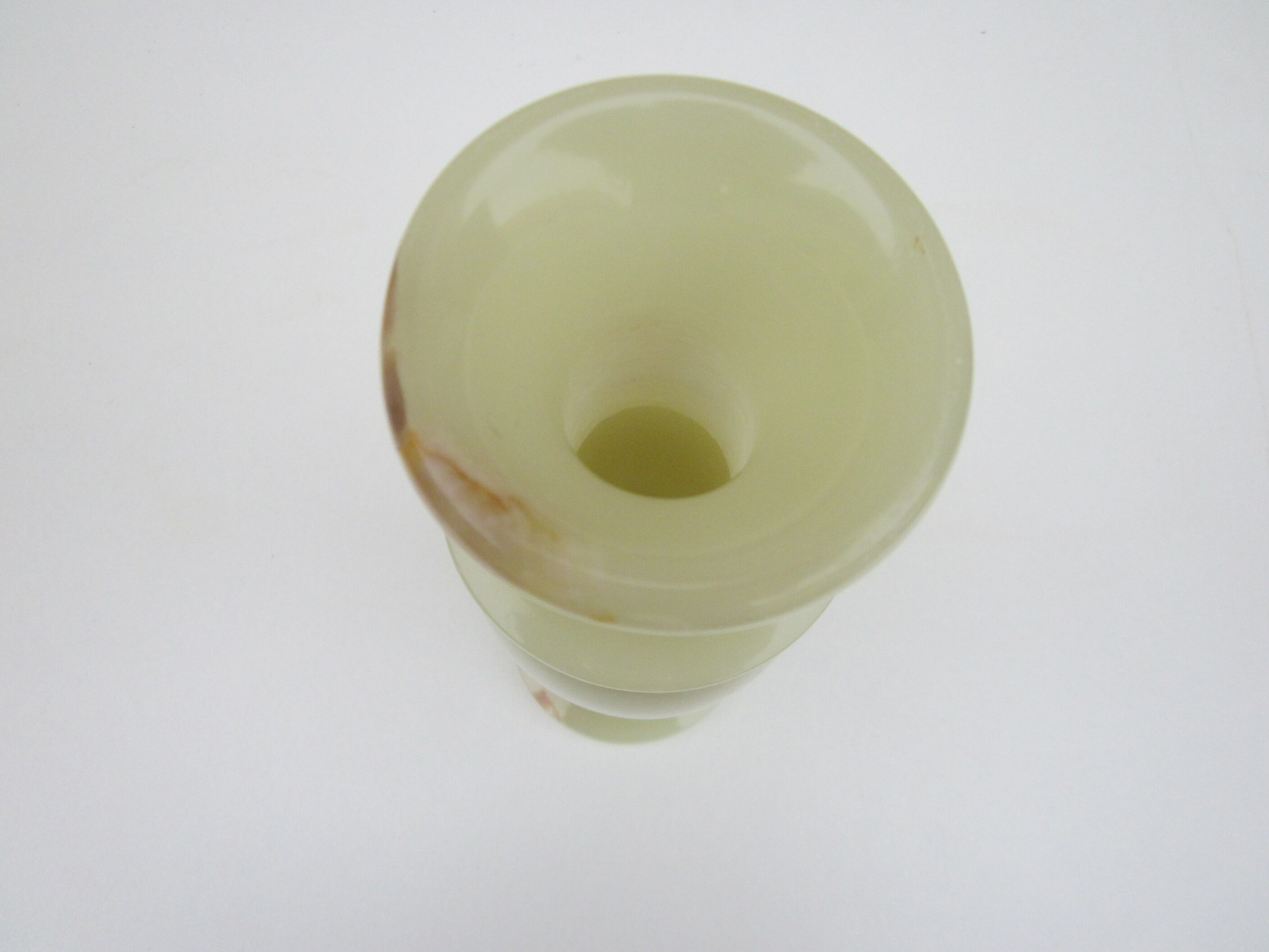 Vase in translucent natural stone of very light green color