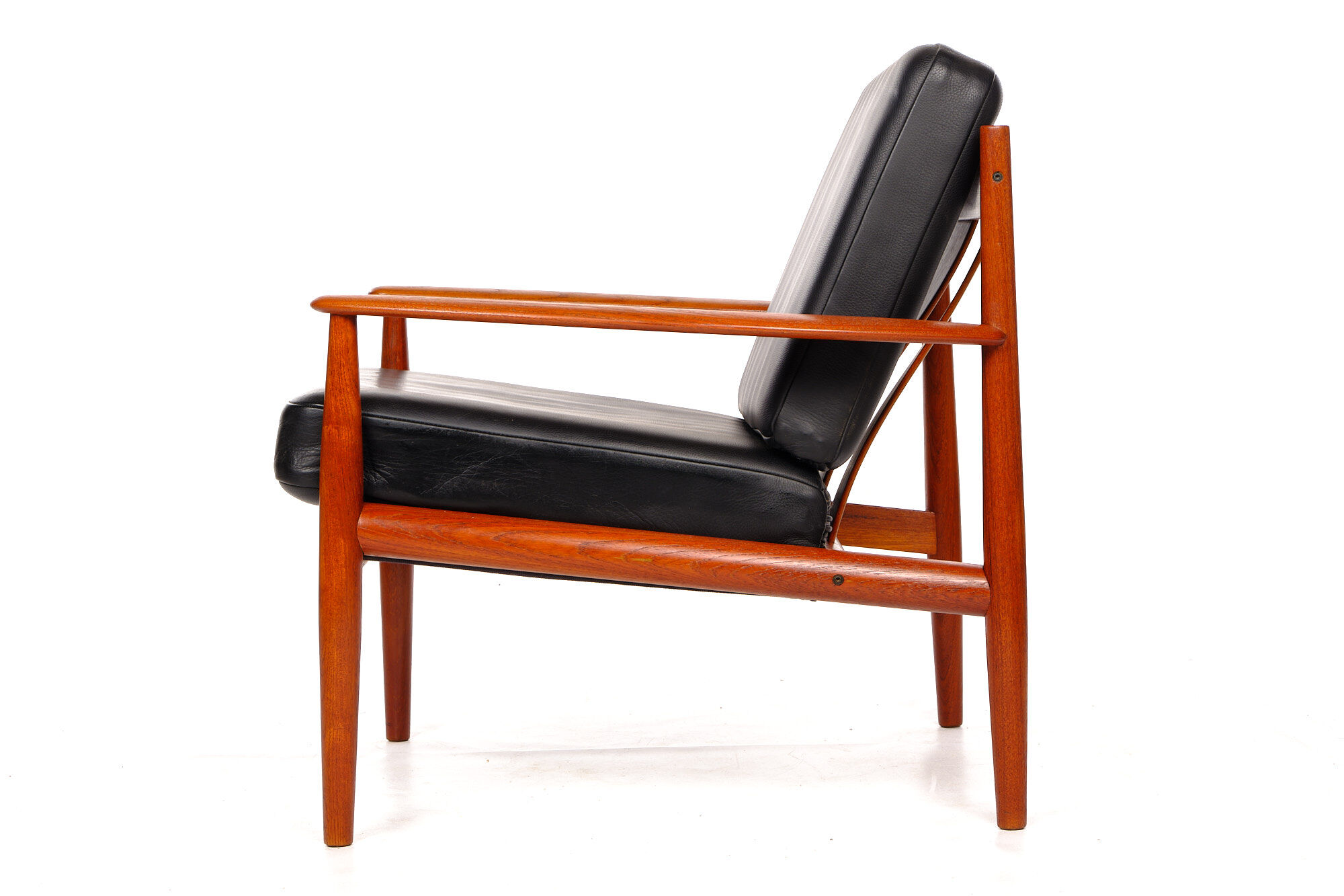 Armchair by Grete Jalk, France Son, cowhide leather and vintage teak from the 1960s