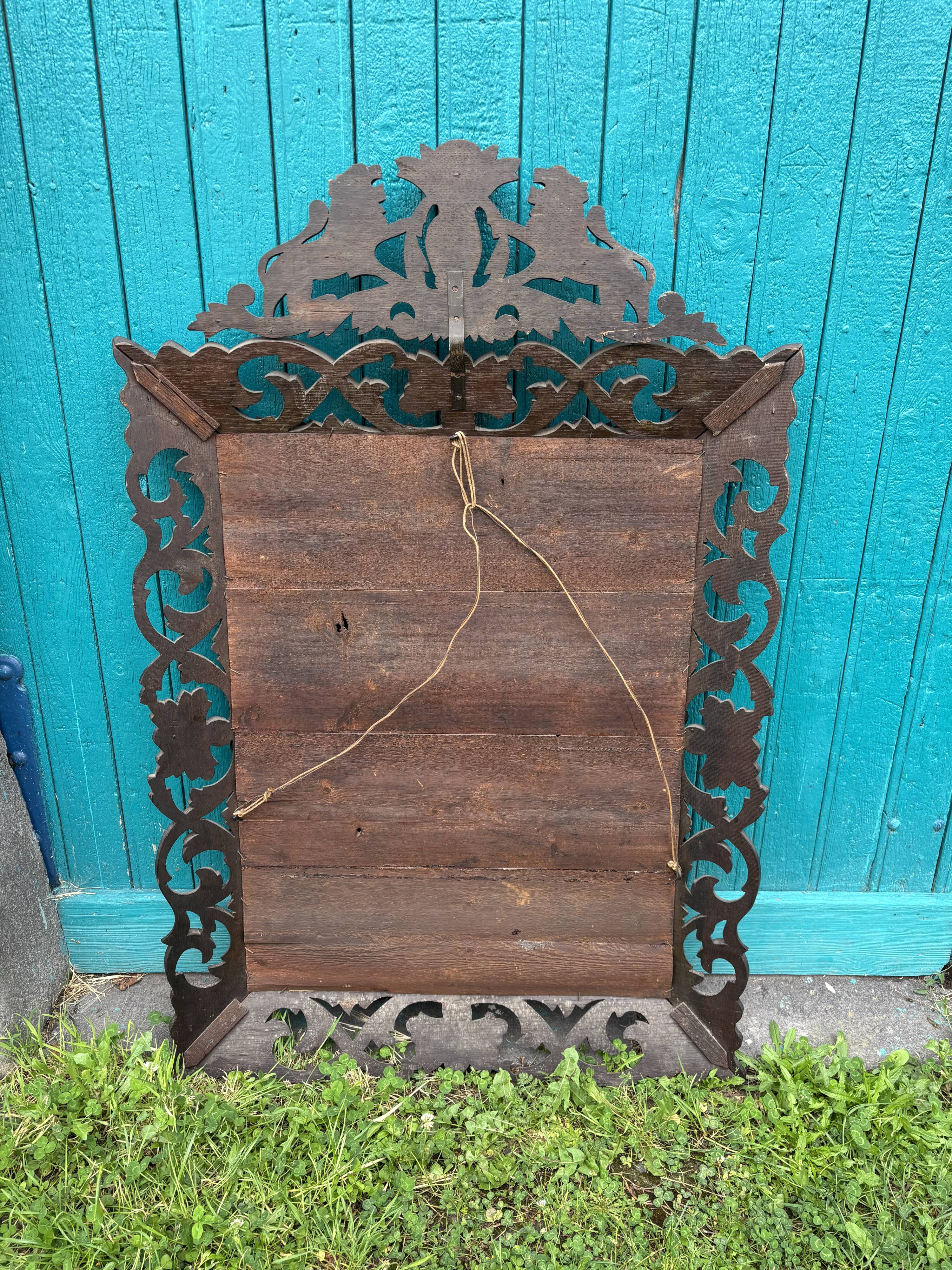 Carved wooden mirror, 19th century vintage.