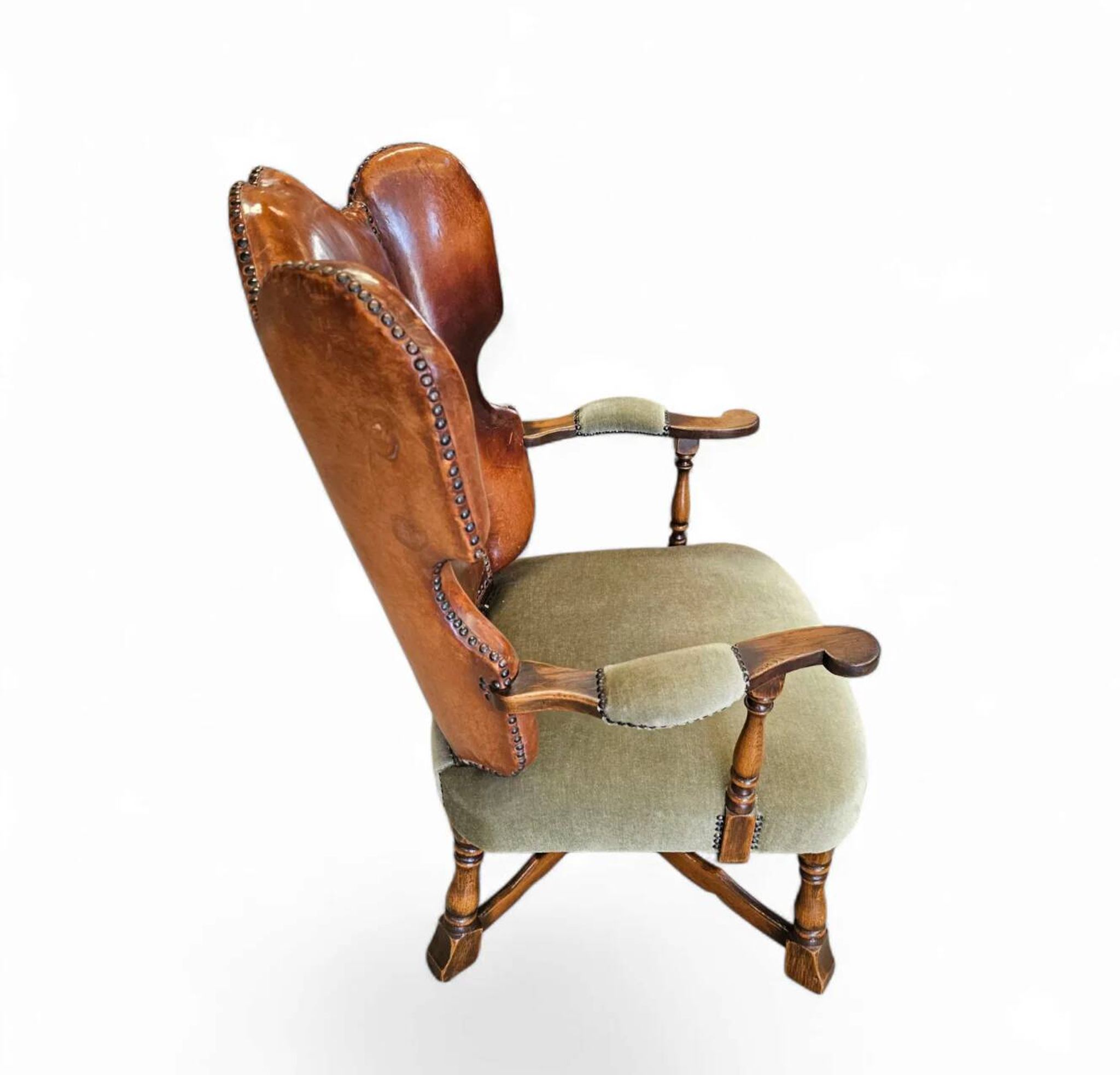 Rare leather and oak wing chair designed by Theo Ruth for Artifort / f 297 from 1949