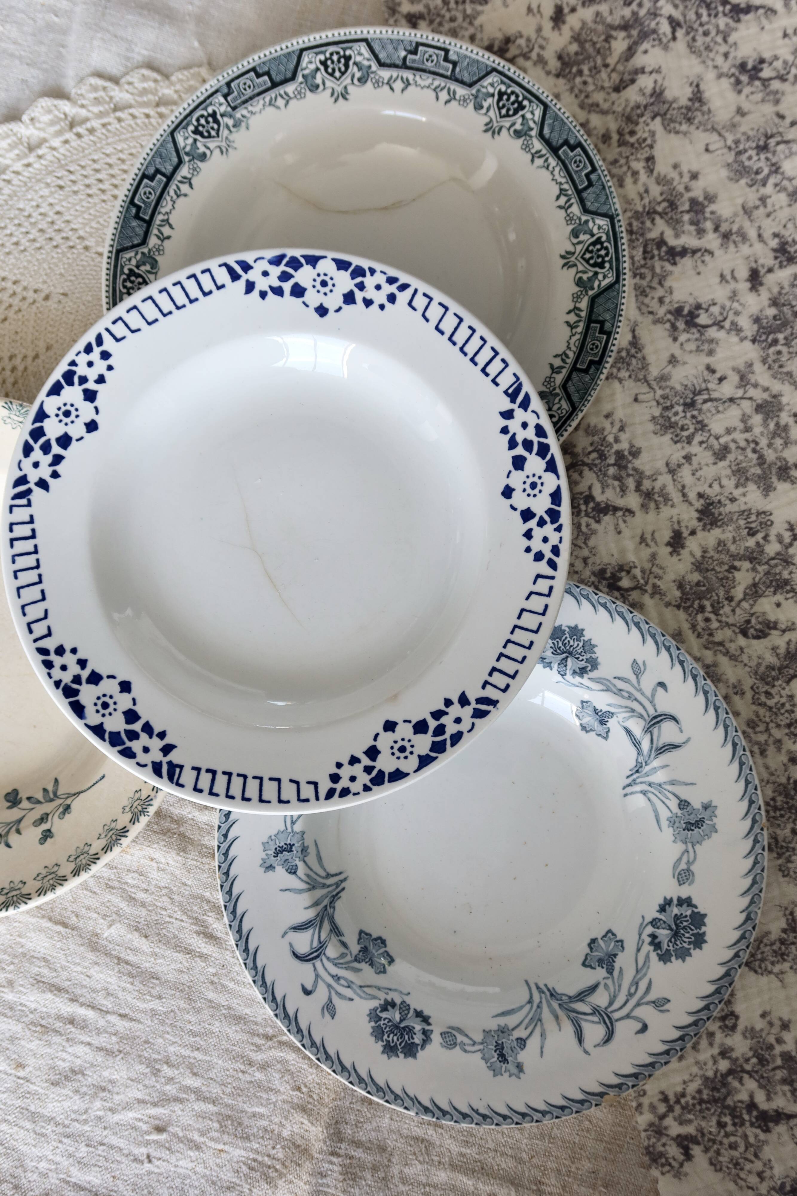 4 vintage blue ironstone soup plates