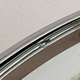 Space Age coffee table. 1970s. Chrome-plated steel and glass.