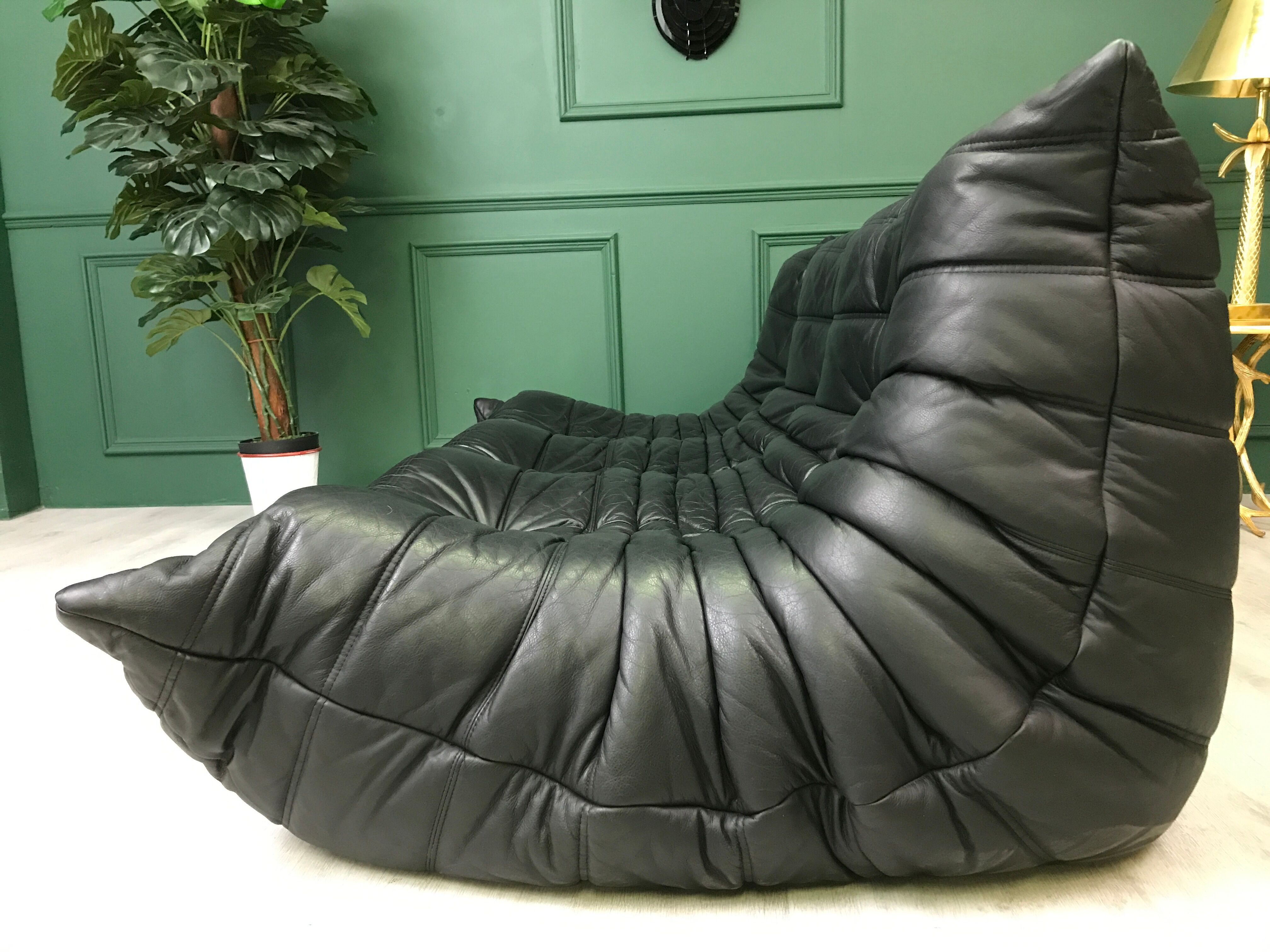 Black leather three seater sofa Togo by Ligne Roset