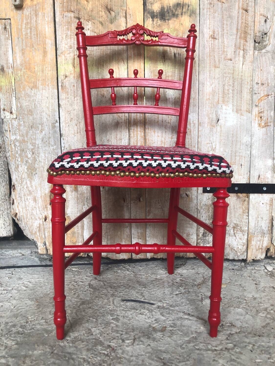 Red carved wood bedroom chair & vintage striped fabric seat