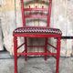 Red carved wood bedroom chair & vintage striped fabric seat