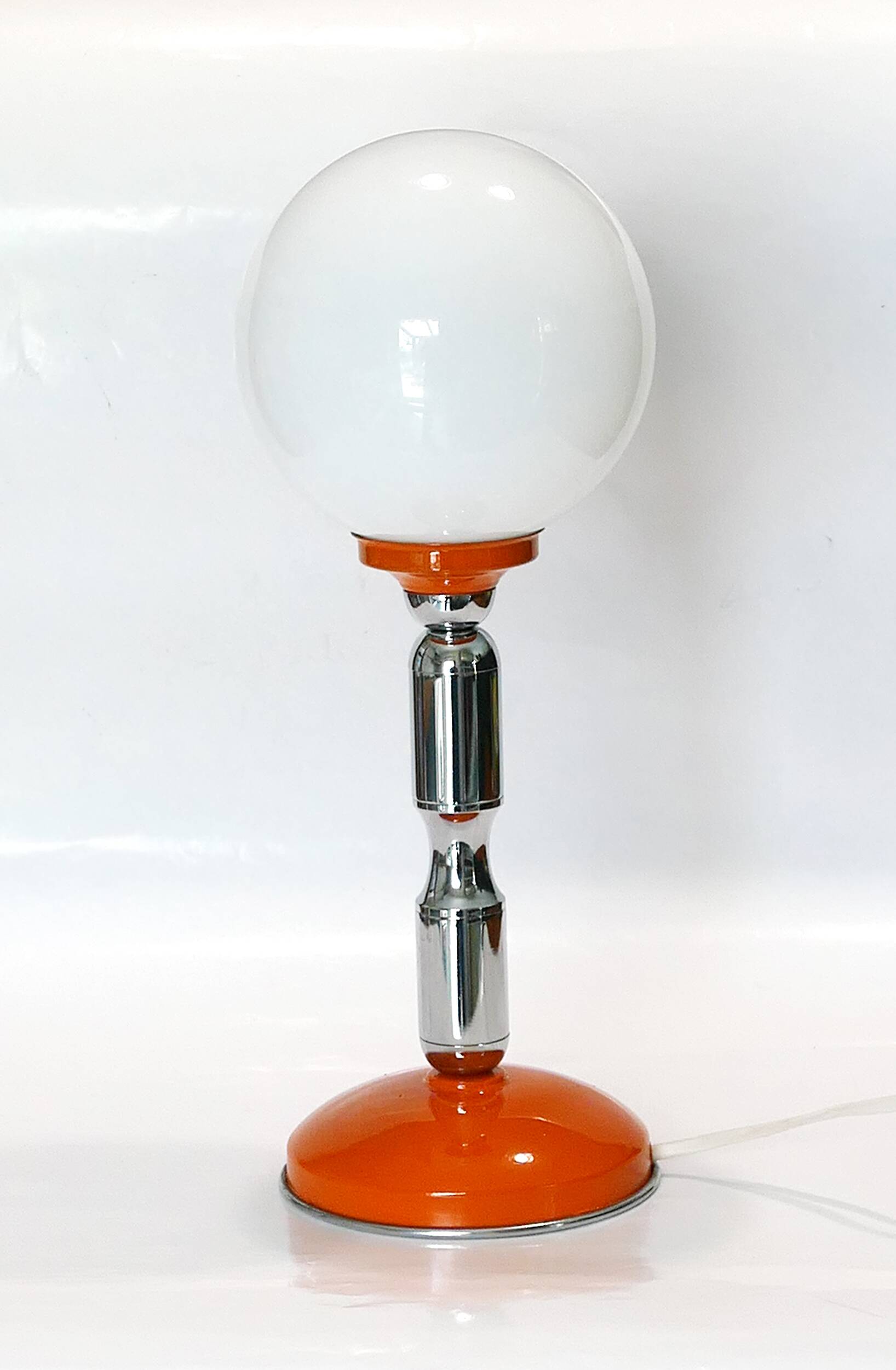 1970s chrome and orange table lamp design