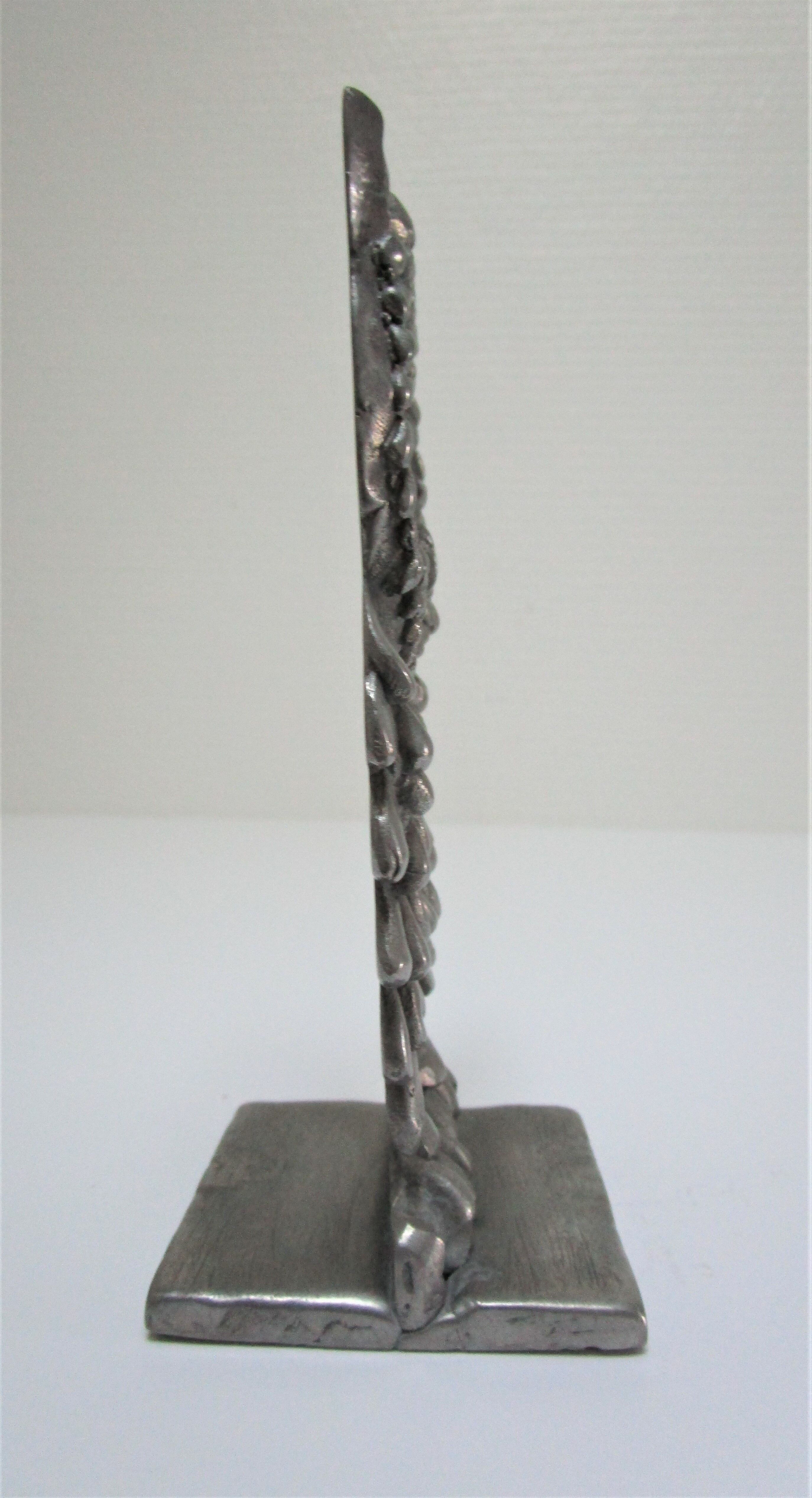 Sculptural paper press nice cast aluminum design 70s