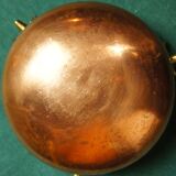 Copper cauldron with golden bronze bull heads