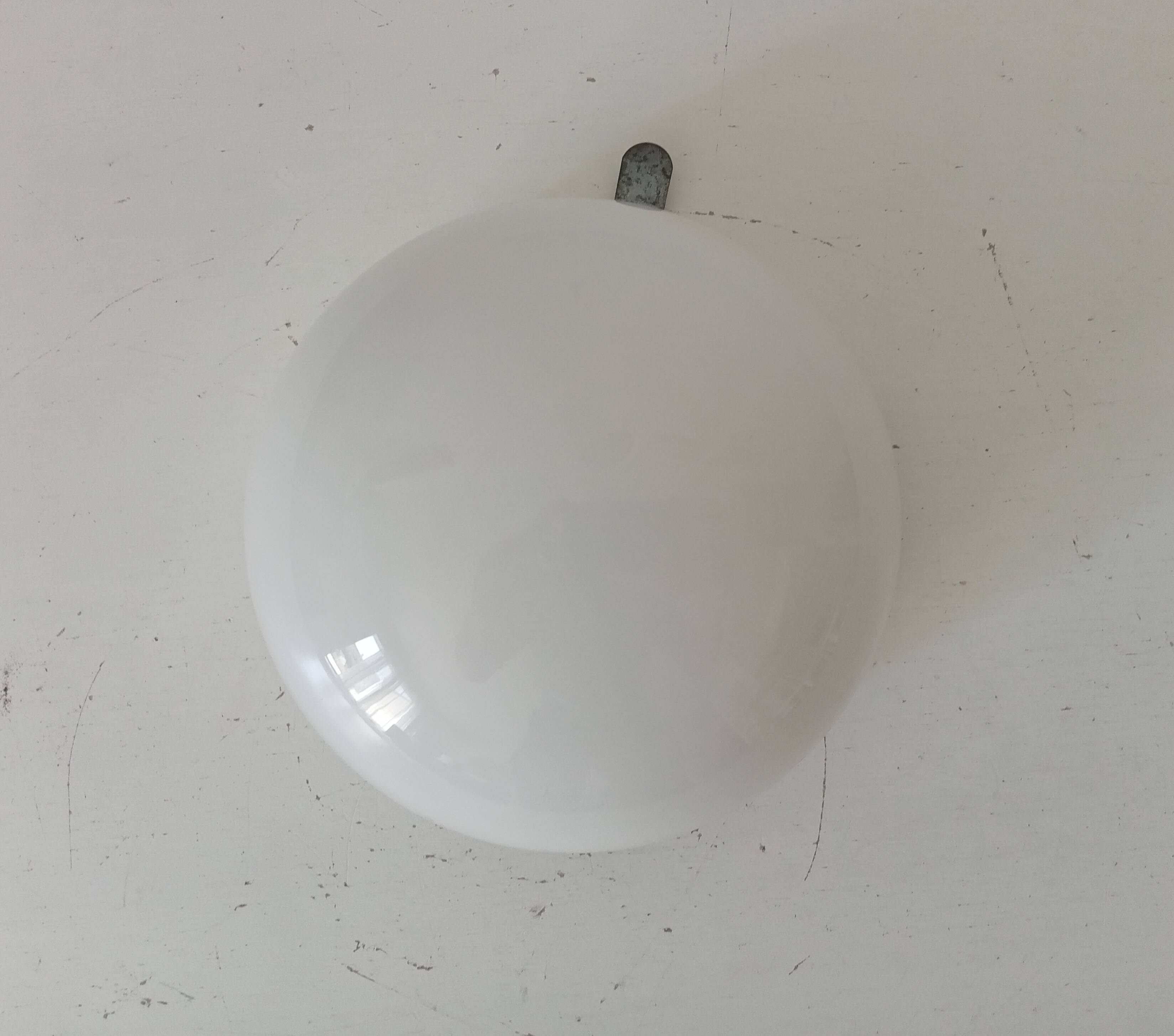 Vintage opaline wall light from the 1960s.