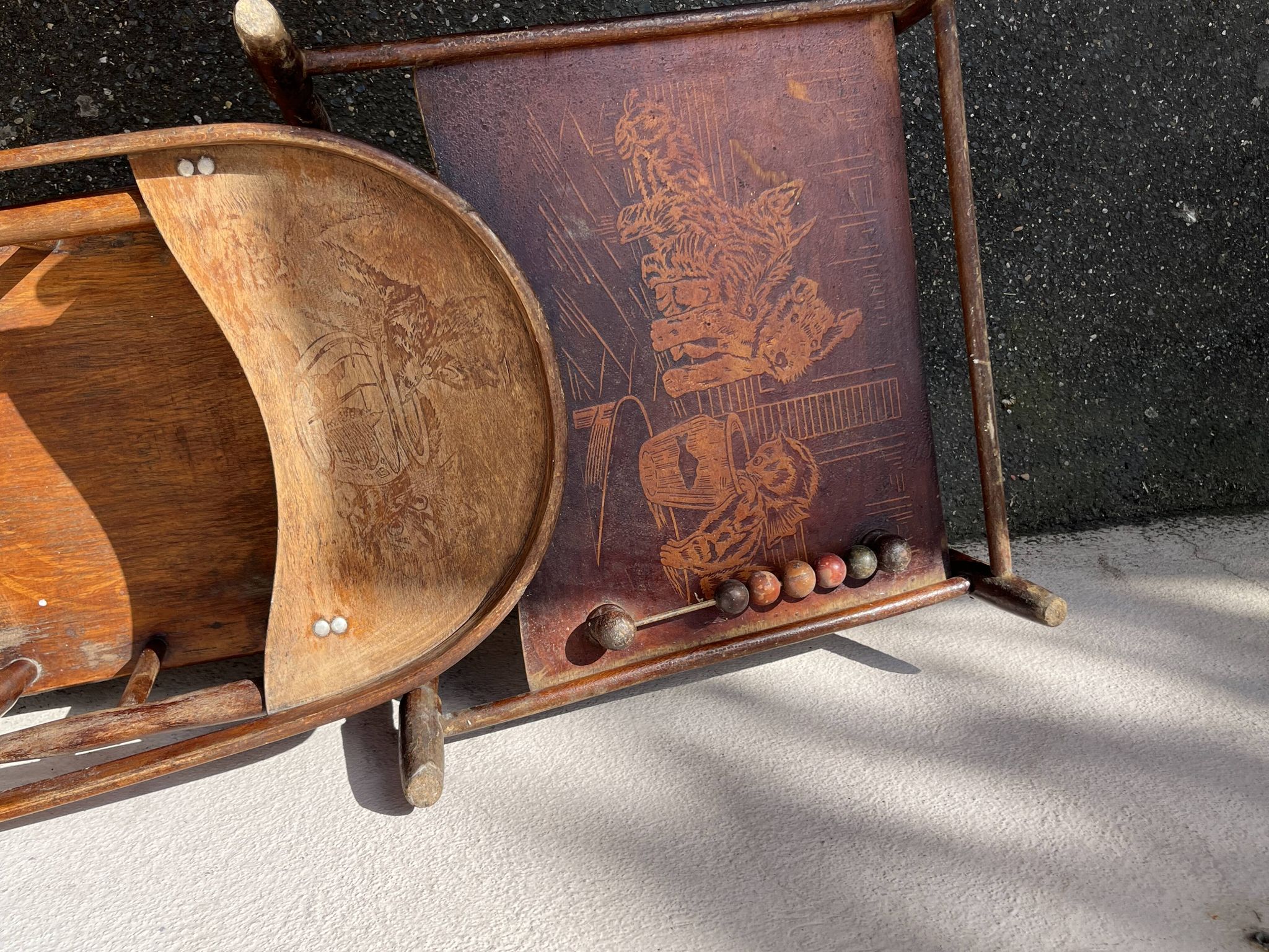 Wooden baby high chair convertible into a small desk from the 1950s