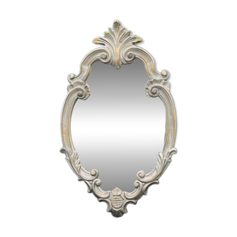 Wall mirror – sculpted silver frame, with a golden reflection and a touch of green –