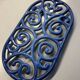 Old cast iron table mat