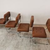 Suite of 4 skai and chrome armchairs 70