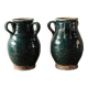 Set of two Chinese green glazed stoneware storage jars.