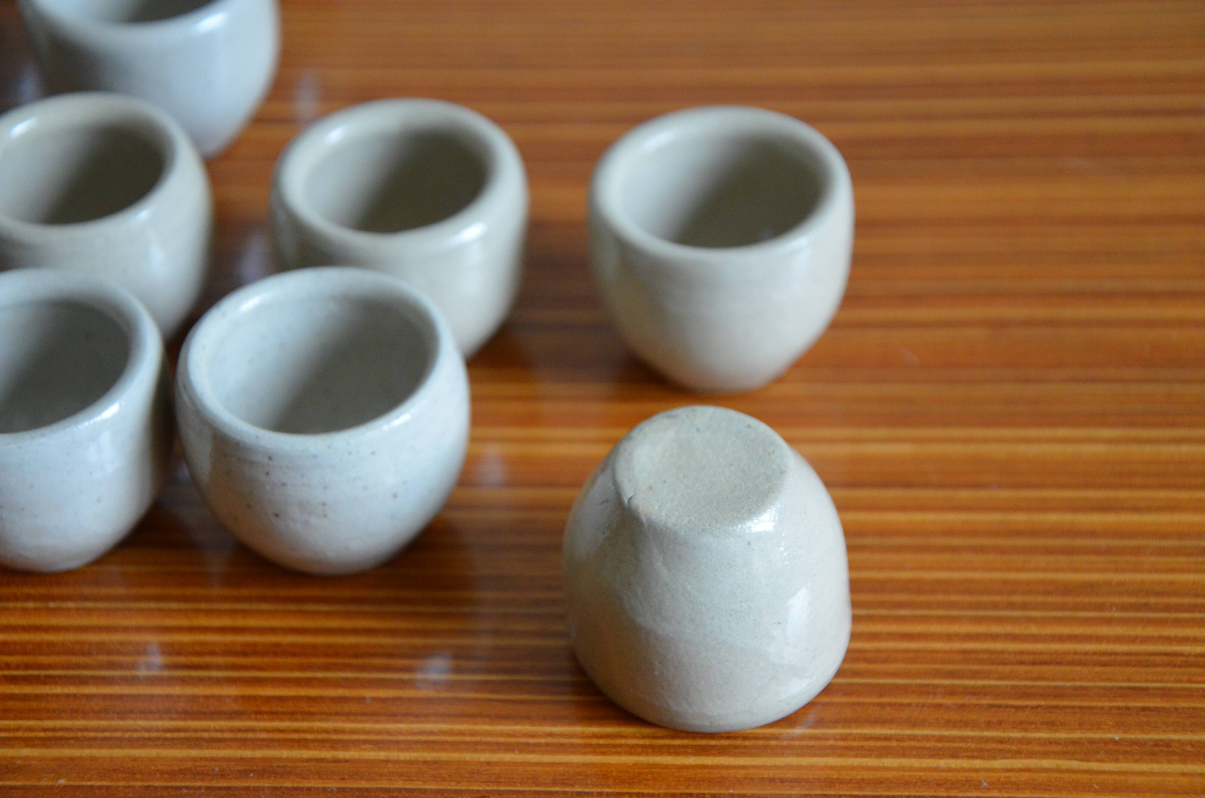 Lot of 12 grey sandstone snail buckets