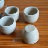 Lot of 12 grey sandstone snail buckets