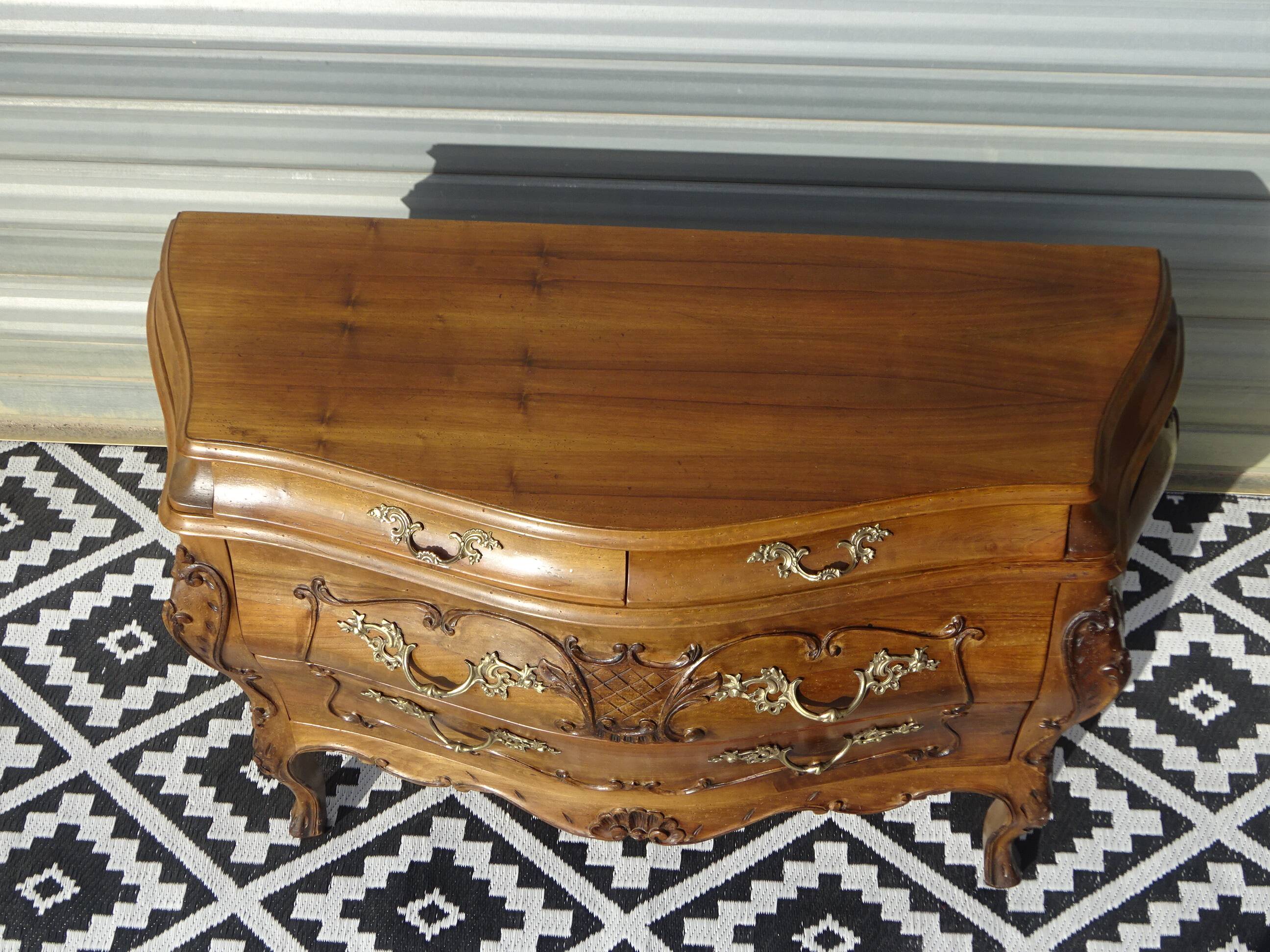 Coffin-style chest of drawers in walnut