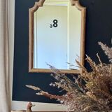 Patinated gilded mirror in wood and plaster