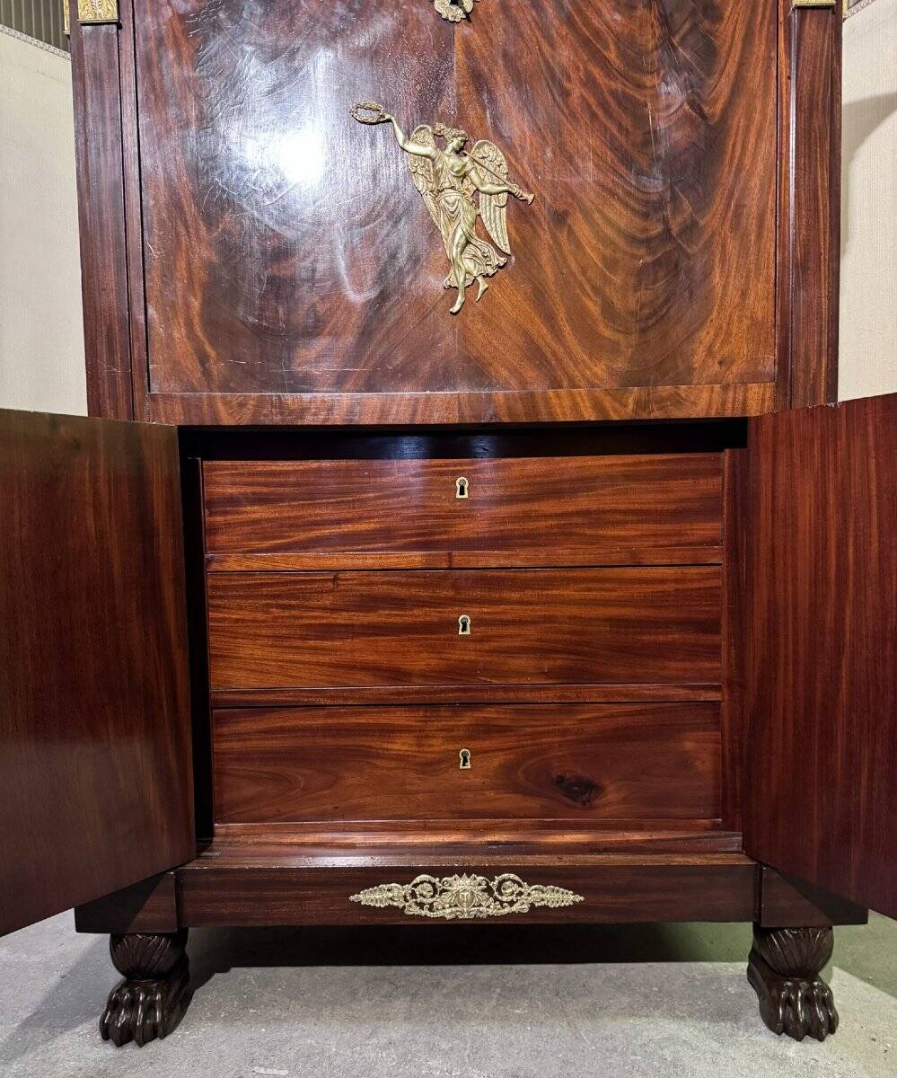 Rare Empire period mahogany secretary with four columns topped with bronze capitals.