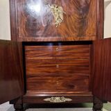 Rare Empire period mahogany secretary with four columns topped with bronze capitals.