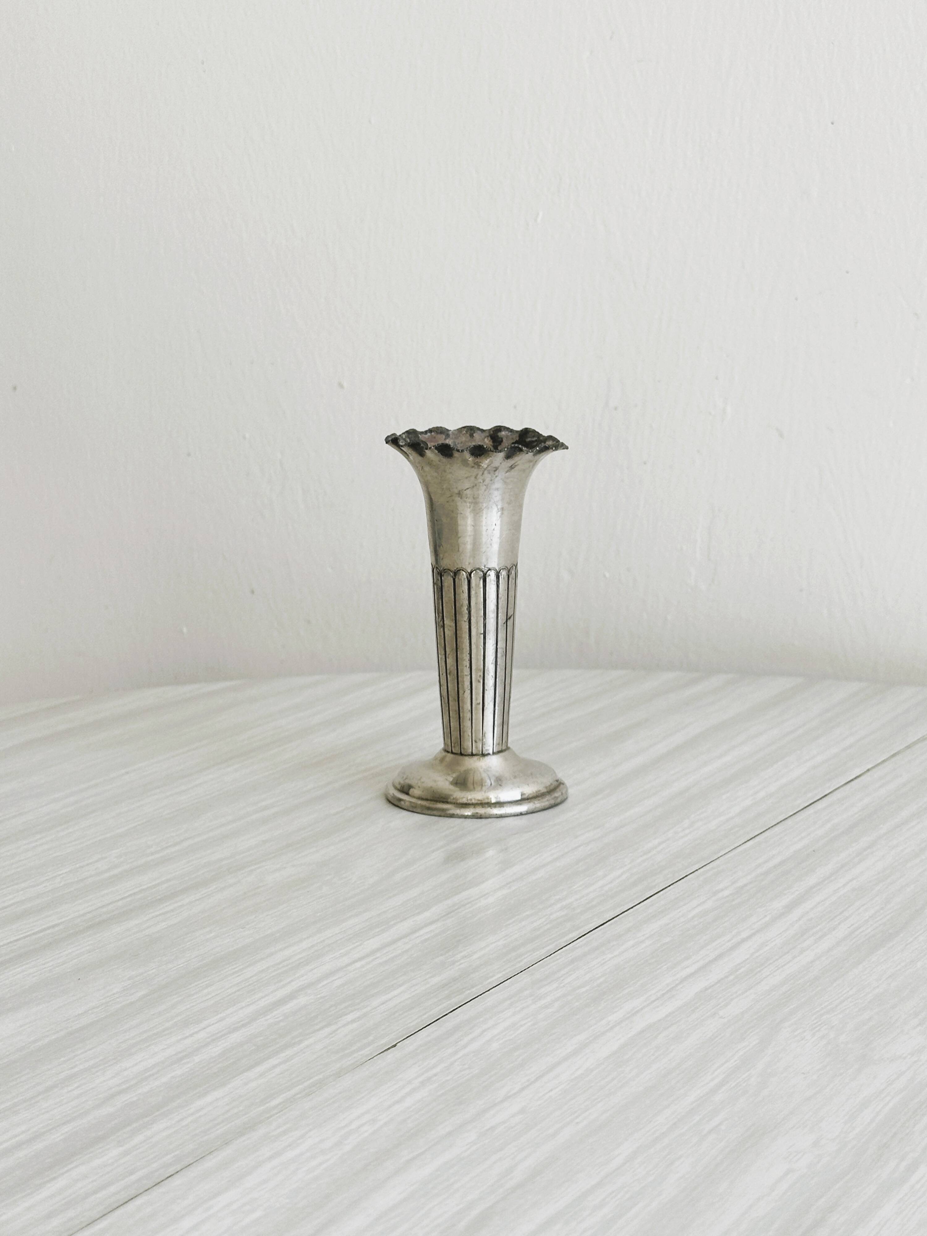 Small vintage soliflore in patinated light metal