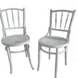 Pair of Lichtig bistro chairs in painted grey beech, pressed seat, circa 1900.