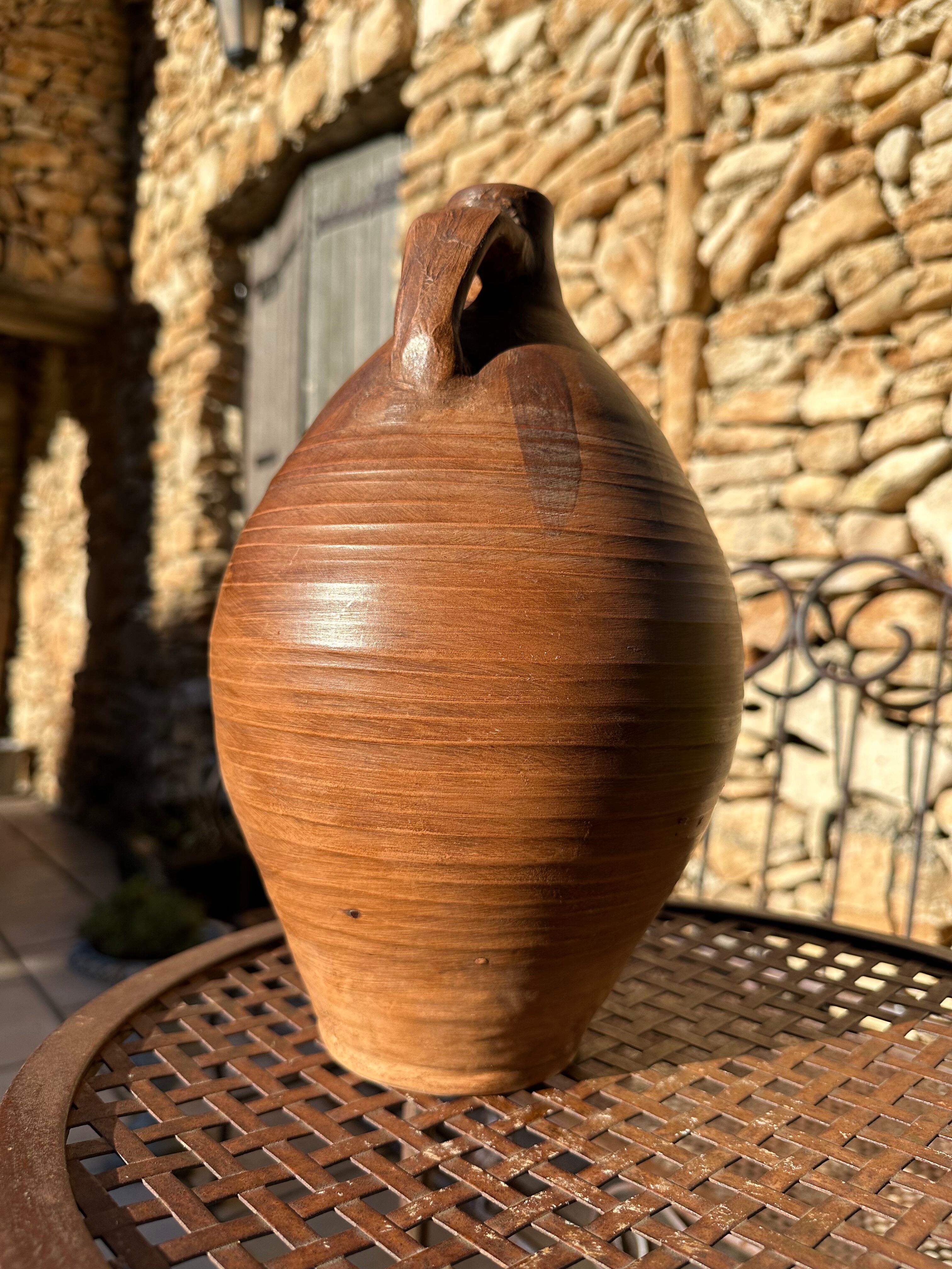 Ancient 19th-century terracotta jug