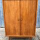 Vintage wardrobe with 2 doors and compass legs, made of oak plywood