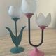 Duo of vintage metal and glass candlesticks