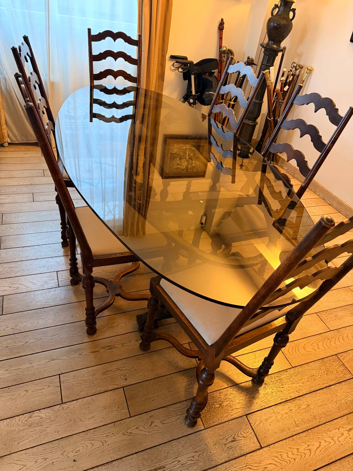 Large antique dining table in wrought iron and smoked glass,
