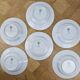 6 deep plates made of Limoges porcelain with a paradise bird design.