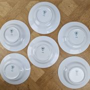 6 deep plates made of Limoges porcelain with a paradise bird design.