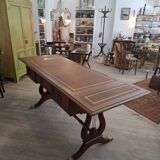 English desk in solid mahogany with lion paws. Leather top
