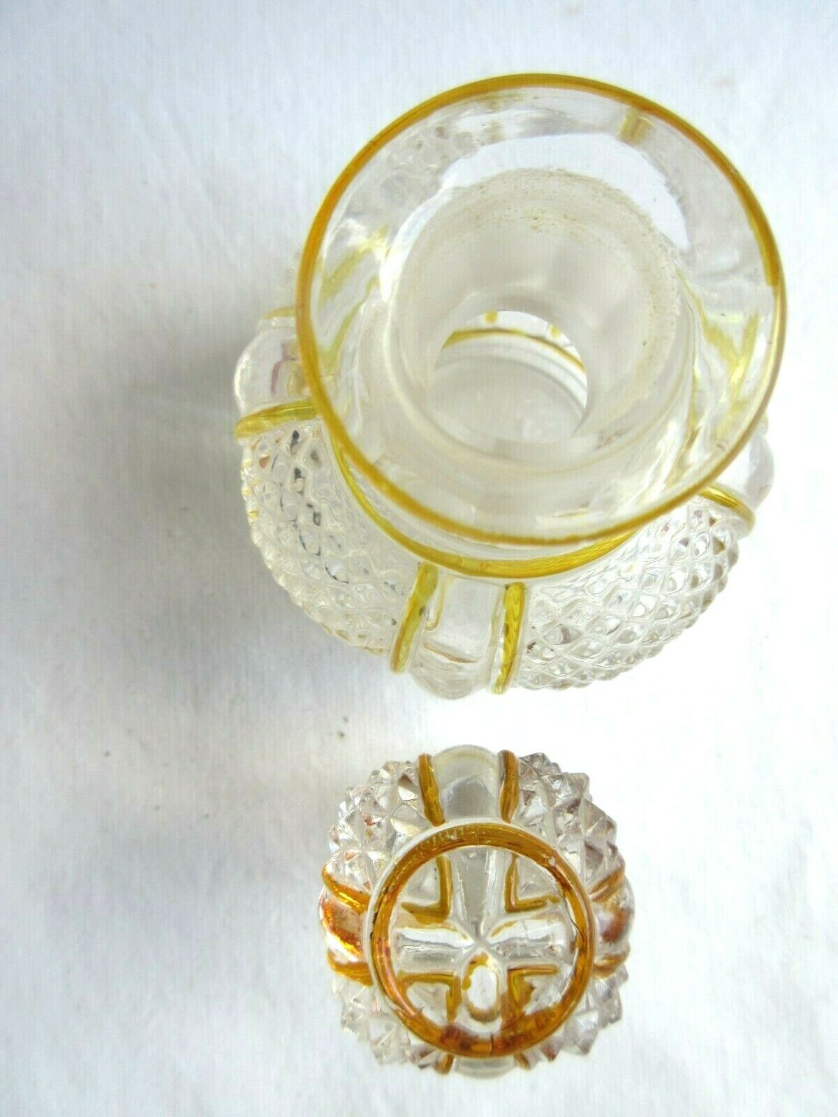 Baccarat perfume bottle, yellow eds and diamond tips