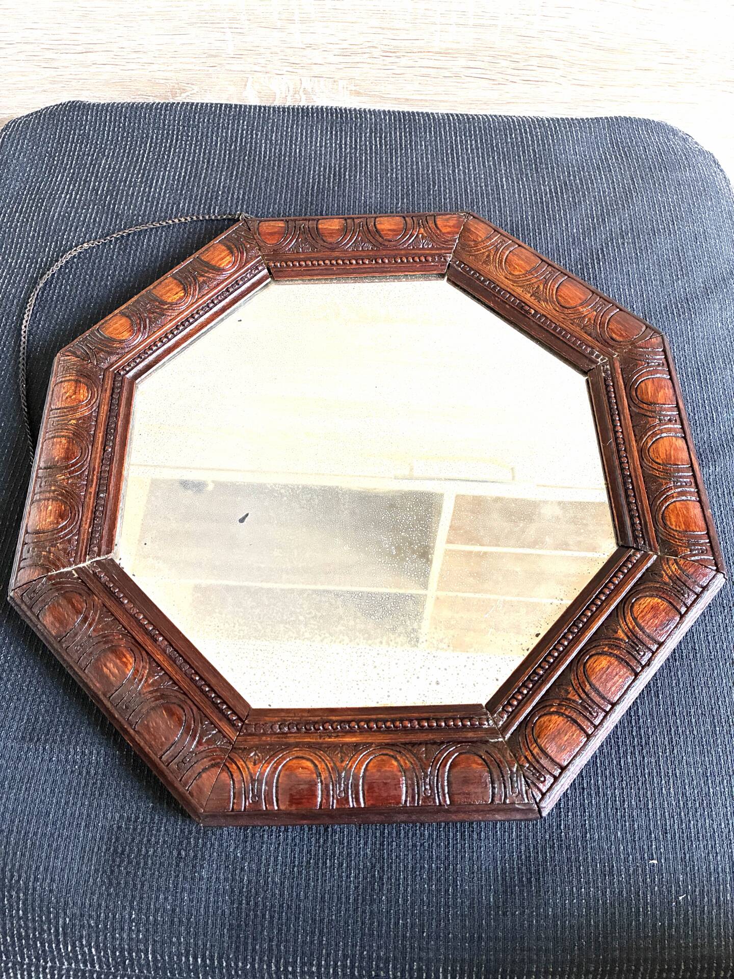 Octagonal mirror, glossy varnished oak, Art Deco.