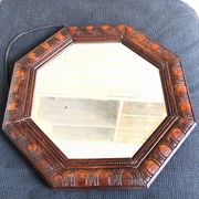 Octagonal mirror, glossy varnished oak, Art Deco.