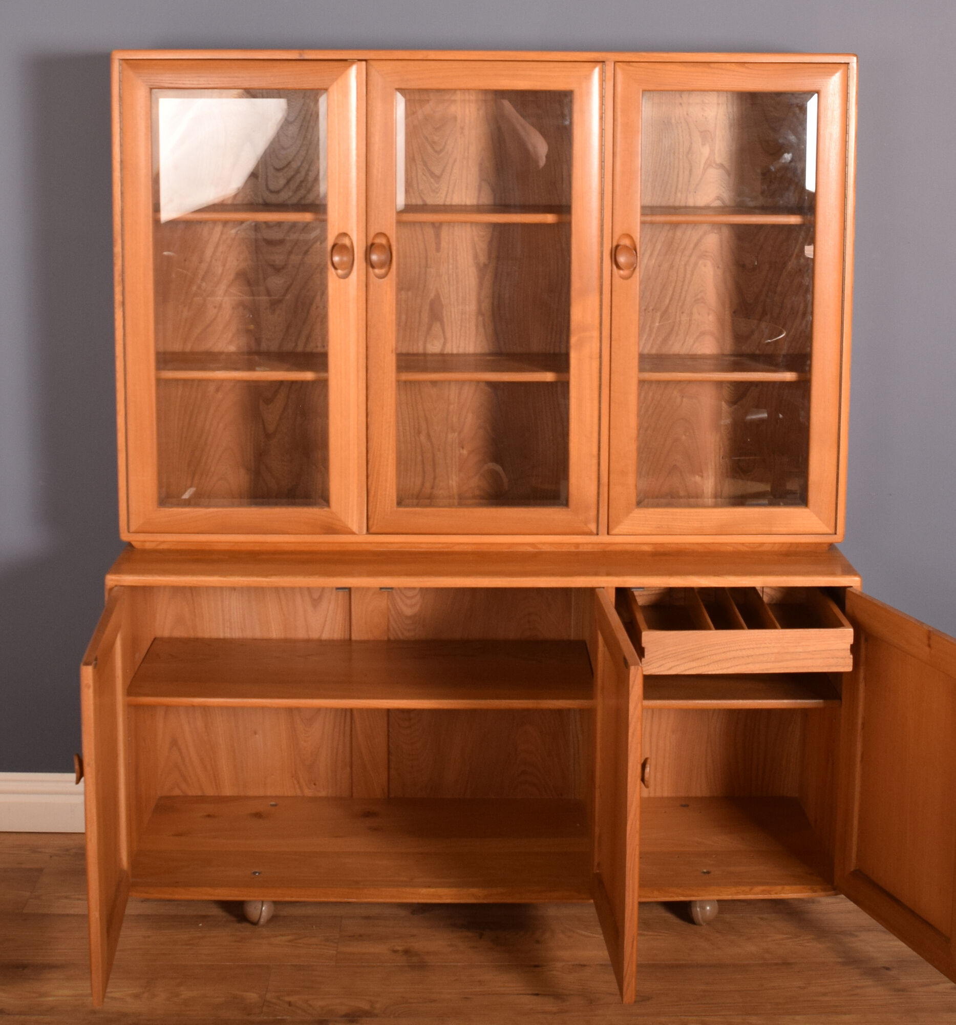 Ercol elm windsor model 806,803 glazed three door cabinet dresser