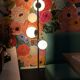 Floor lamp with 5 frosted glass globes and a metal stem