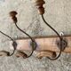 Wall-mounted coat rack with 3 hooks, 19th century.