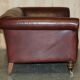 Vintage Art Deco leather sofa, three-seater, feather cushions.