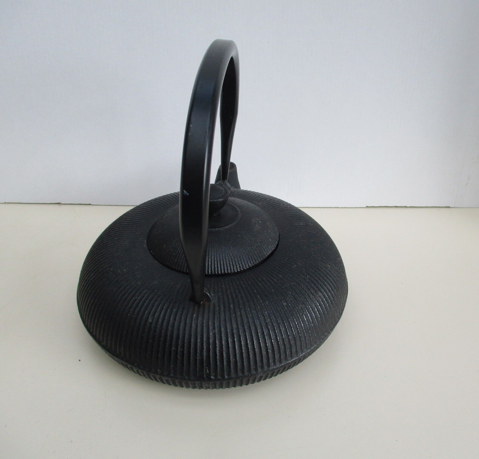 Asian teapot in black cast iron
