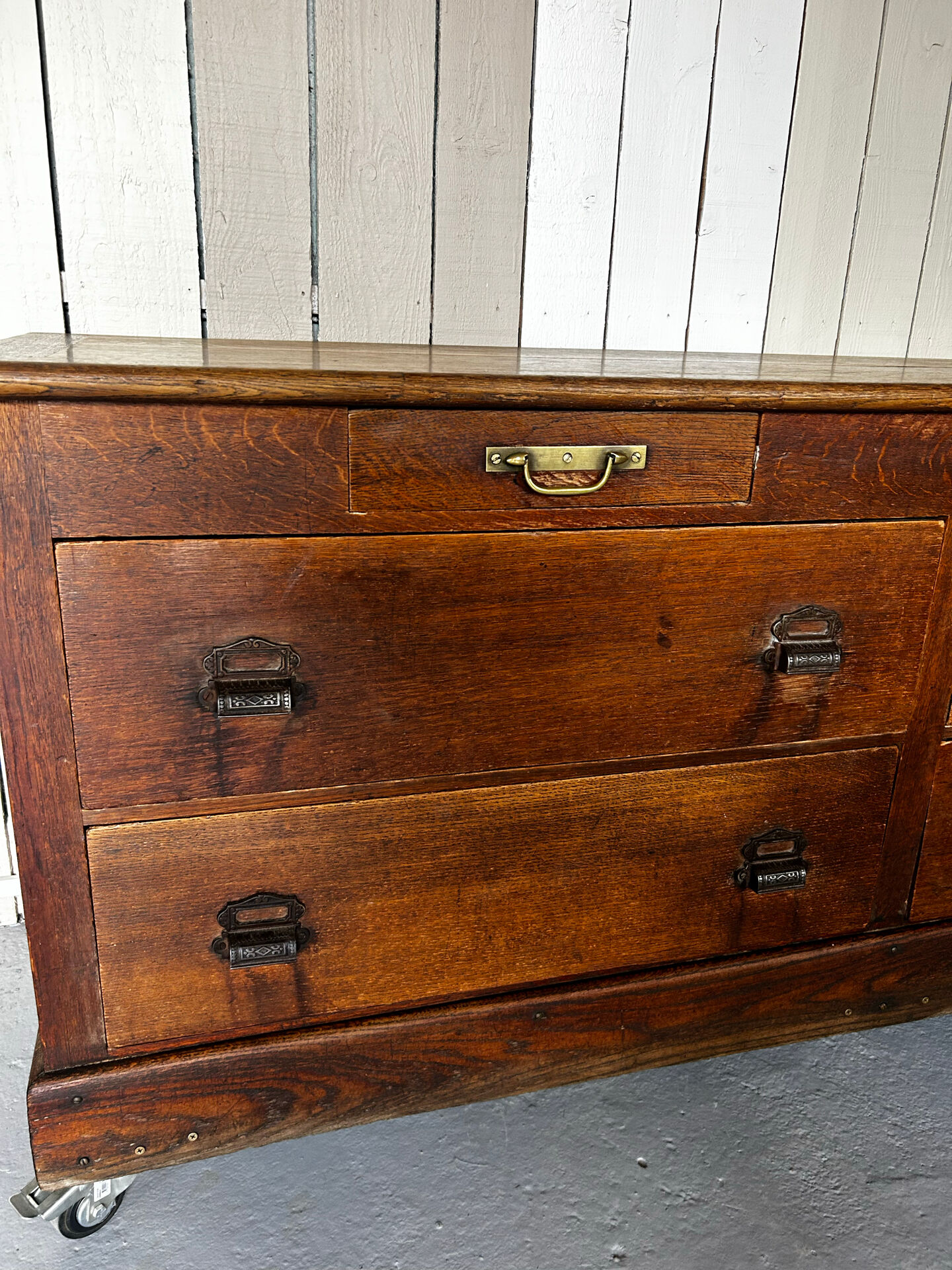 Large antique haberdashery counter in oak